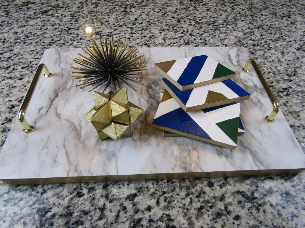 How to use contact paper to make a marble and gold handle tray. DIY Marble and gold tray.